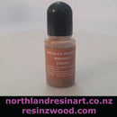 Bottle of metallic pigment labeled 'Bronze' on a white background with branding text at the bottom.