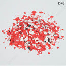 Red, white, and black decorative pieces on a light gray background
