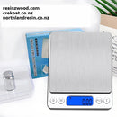 Digital table top scale with a blue box in the background