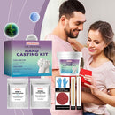 Hand Casting Kit packaging with a couple holding a mold, on a light purple background.