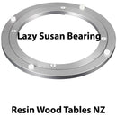 Metal lazy susan bearing with text 'Lazy Susan Bearing' and 'Resin Wood Tables NZ' on a white background