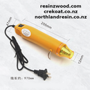 Yellow hot air gun with measurements on a white background, featuring website addresses.