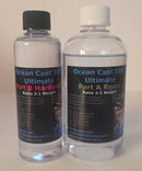 Two bottles of Ocean Cast 100 Ultimate resin system on a light background