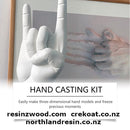 Hand casting kit with a hand sculpture and promotional text on a white background
