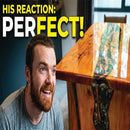 Man with a beard smiling next to a wooden table with text 'HIS REACTION: PERFECT!'