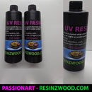 Three bottles of UV Resin by Resinzwood on a white background