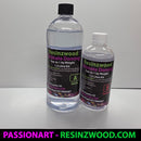 Two bottles of Resinzwood Ultimate Doming resin kit on a white surface with a gray background.