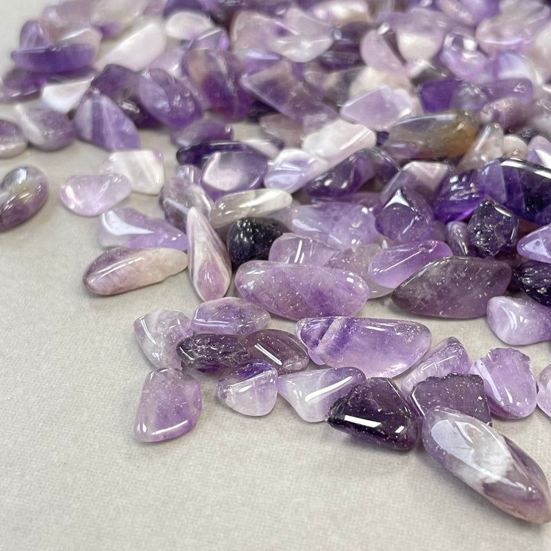 Amethyst tumbled stones 200 grams