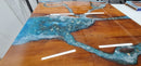 RESINZWOOD Crystal Clear Tabletop Resin shown here on a river table